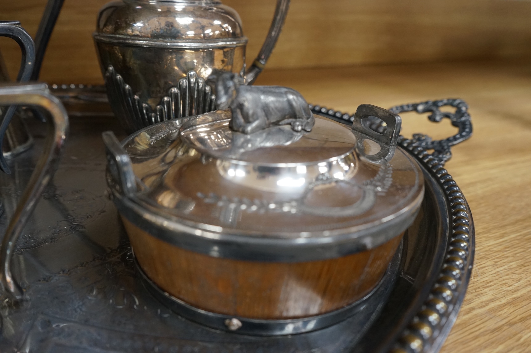 A collection of Victorian plated wares to include a pair of Corinthian column candelabra, 54cm